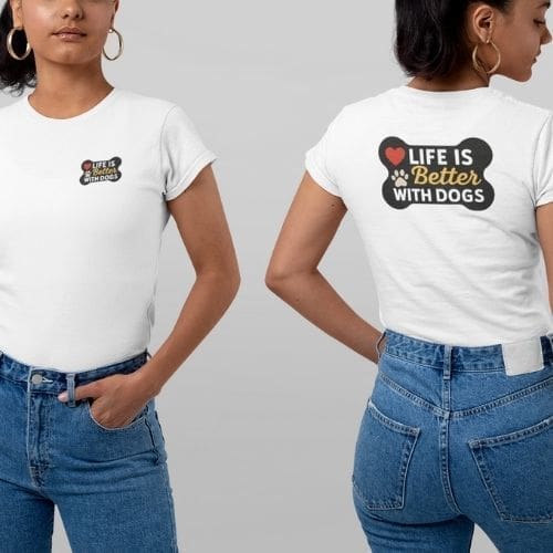Two women wear white Heavyweight Unisex Crewneck T-shirt | GildanÂ® 5000 with blue jeans. The front shows a small paw print logo; the back says “Life is better with dogs” in playful text, featuring a red heart and paw print dog bone design.