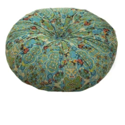 Round teal blue bohemian-style cushion with floral and geometric patterns designed for mindfulness and home comfort.