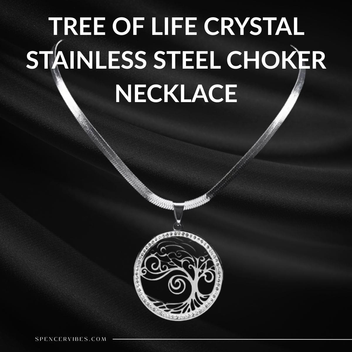 Showcased on sleek black fabric, the Tree of Life Crystal Stainless Steel Choker Necklace features a detailed silver circular pendant with sparkling crystal accents. Bold white text above highlights the product name.