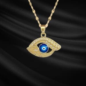 The Titanium Steel Devil's Eye Necklace for Women is an elegant fashion jewelry accessory featuring a versatile choker chain and a striking eye-shaped pendant, displayed on black fabric with smooth, flowing folds.